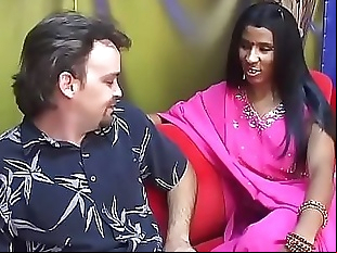 Young Indian lady gives an older man a blow job..